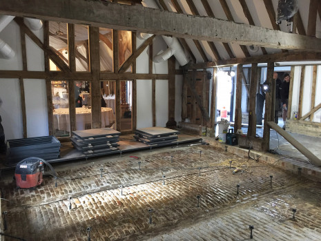 Heritage Barn Conversion for wedding venue with glass floor under construction